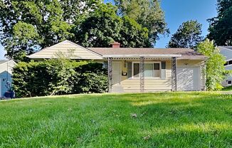 Charming 3-Bedroom Home with Sunroom, Fireplace & Garage in Kansas City, MO!