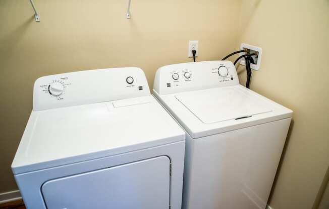 a washer and dryer are available in the laundry room