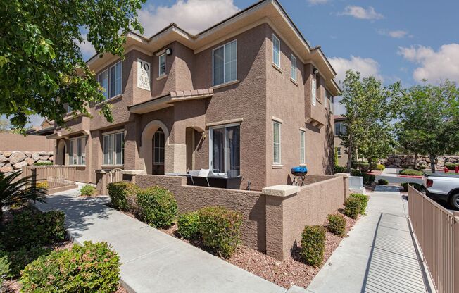 NW townhome with 2 car garage in gated community.