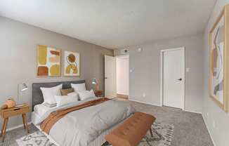 a bedroom with a large bed and a closet