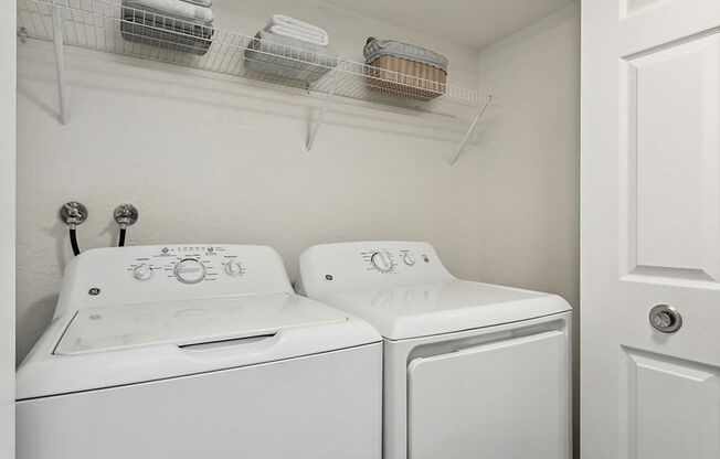 Model Washer and Dryer Hook Up Area at Broadmoor Village Apartments in Salt Lake City, UT.