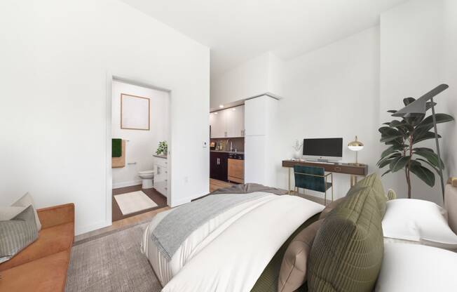 a bedroom with a bed and a bathroom