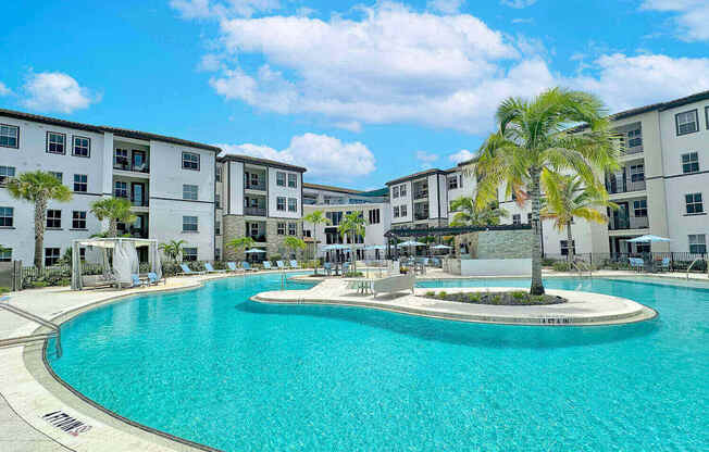 Beach-entry saltwater pool with sun shelves
