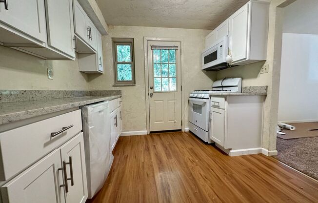 Gorgeous Three Bedroom Duplex in Castle Shannon! Attached Garage, Back Yard & More! Call Today!