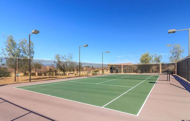 a person on a court with a racket