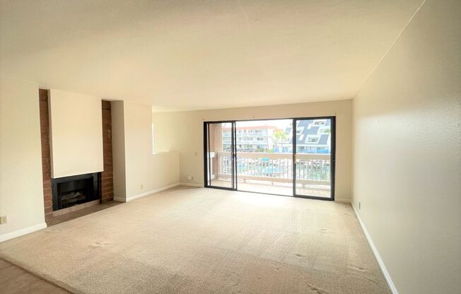 A 2 bedroom, end-unit, with water views...at this price? YES!!