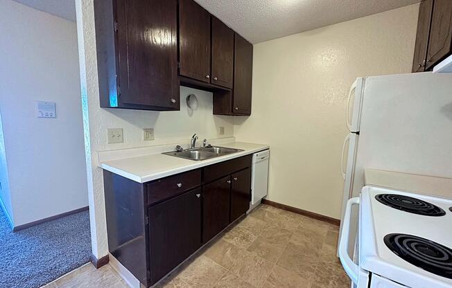 a kitchen with a sink and a microwave