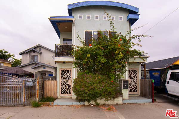 8703 S SAN PEDRO ST