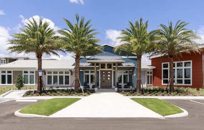 Clubhouse exterior with beautiful palm trees