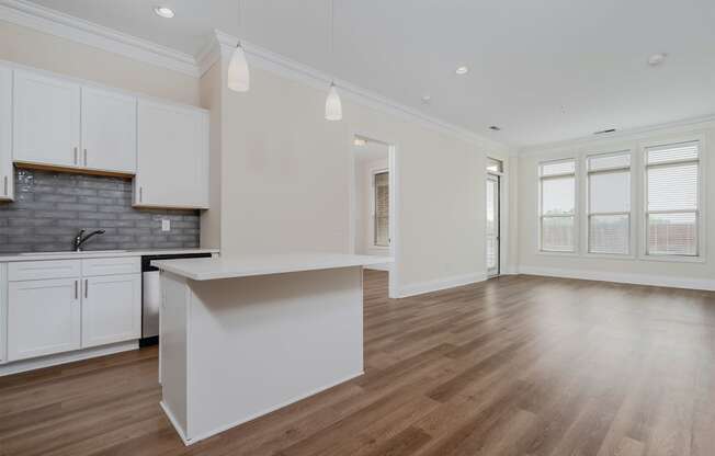 a kitchen and living room in a 555 waverly unit