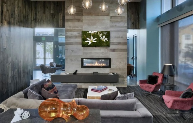 Indoor Lounge with Fireplace and TV