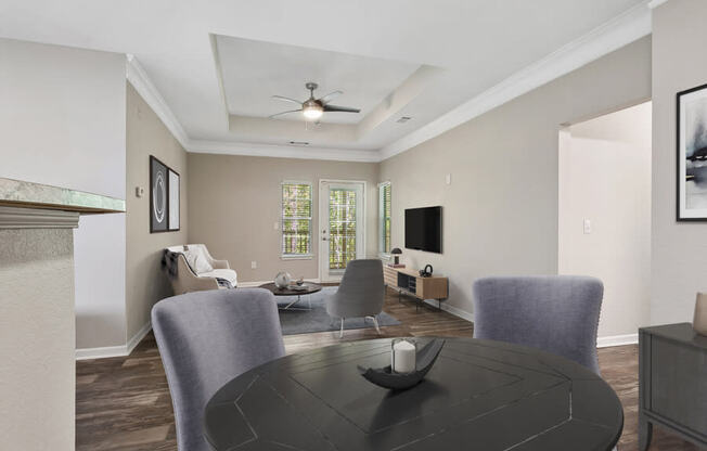 Model apartment dining room with a table and chairs