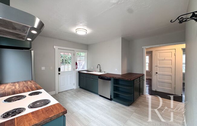 Charming Upper Unit with Modern Kitchen, Wraparound Layout & Walkable to PSNS