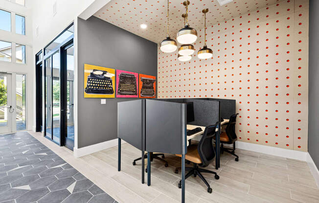 a dining area with a table and chairs in a room with a door