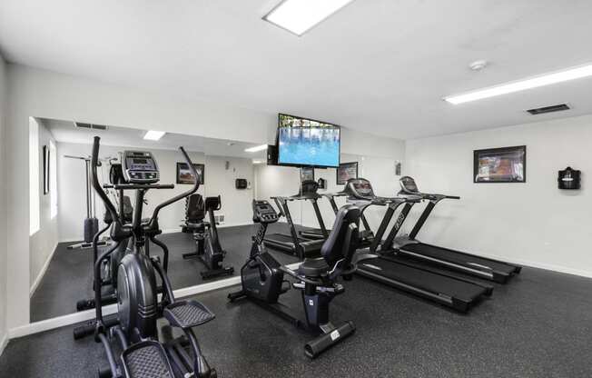 Fitness Facilities with mirrored wall at Willows Court Apartment Homes, Seattle, WA