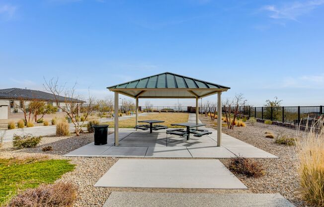 STUNNING SINGLE STORY 4 BEDROOM 2.5 BATHROOMS 3 CAR GARAGE IN GATED SUMMERLIN COMMUNITY WITH A STRIP VIEW!!