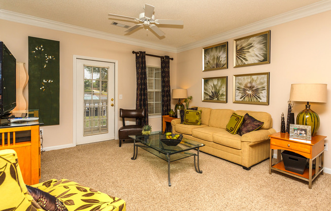 View of Living Room, Showing Ceiling Fan and Door to Patio at Summer Park Apartments