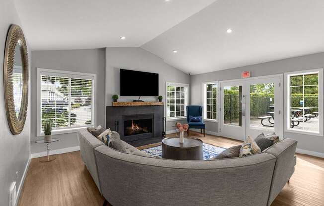 a living room with a couch and a fireplace