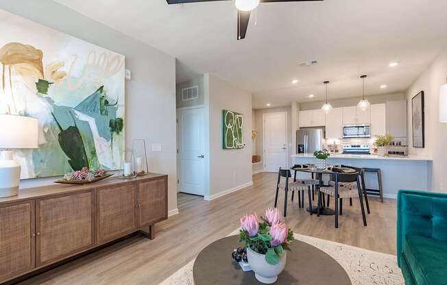 a living room with a dining room and a kitchen
