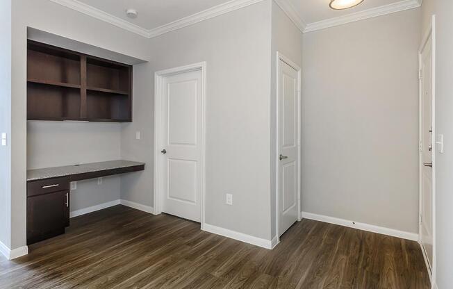 a kitchen with a wood floor