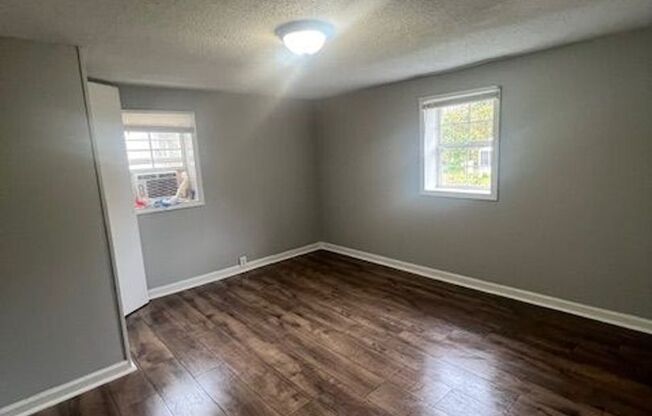 Charming 2BR Home with Large Front Porch & Spacious Kitchen