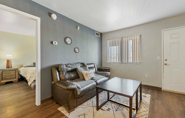 Step into comfort with this cozy living space, perfect for relaxation and style.