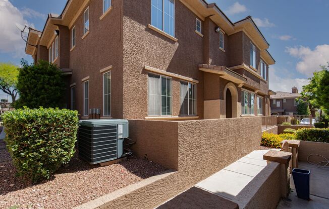 NW townhome with 2 car garage in gated community.