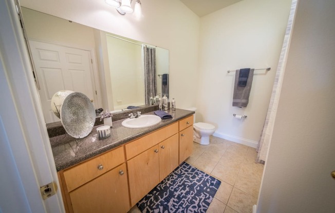 a star made out of shattered glass on a wall