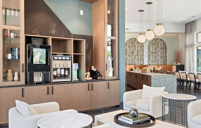 A modern living room with a white sofa and a coffee table.