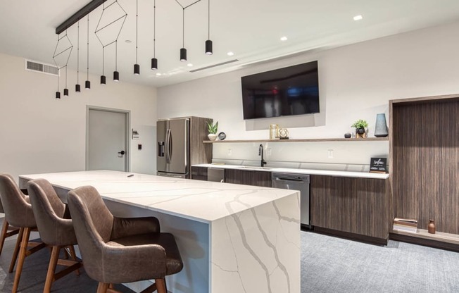 Eat-In Table With High Chairs In Clubhouse at Residences at Richmond Trust, Richmond