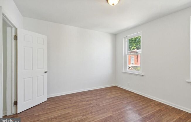 Welcome to this updated 2-bedroom, 1-bathroom row home in the historic Strawberry Mansion neighborhood.
