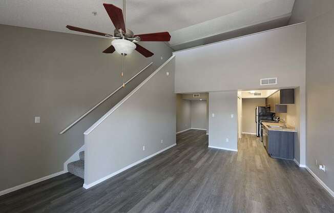 a living room with a ceiling fan