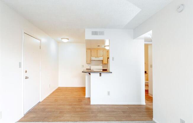 Living Room with Kitchen View at Cimarron Place Apartments, Tucson, AZ, 85712