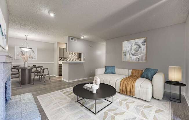 A living room with a fireplace and a couch.