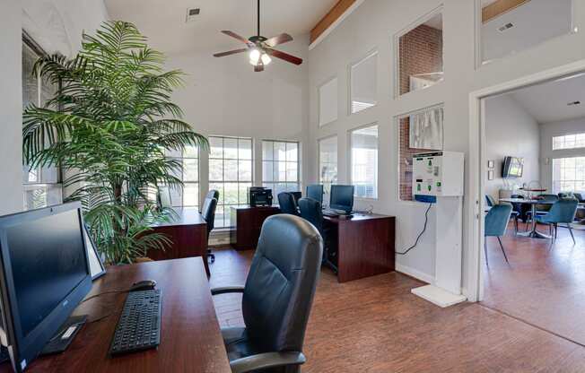 a home office with a desk and a computer