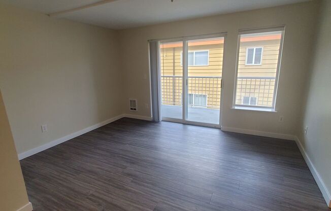 TWO WEEKS FREE! Sleek and Spacious 2x2 with Gated Parking and In-Unit Laundry