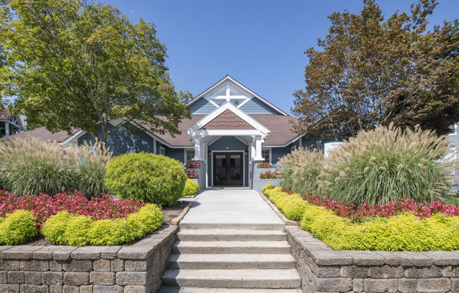 a house with a garden in front of it