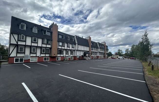 an empty parking lot in front of an apartment building at Kings Court, Anchorage ? 