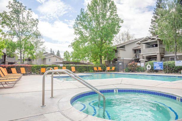Outdoor Heated Saltwater Pool With Hot Tub Open Year-Round at Bent Tree Apartments, Sacramento, CA