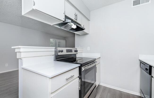 a kitchen with a stove top oven sitting inside of a refrigerator