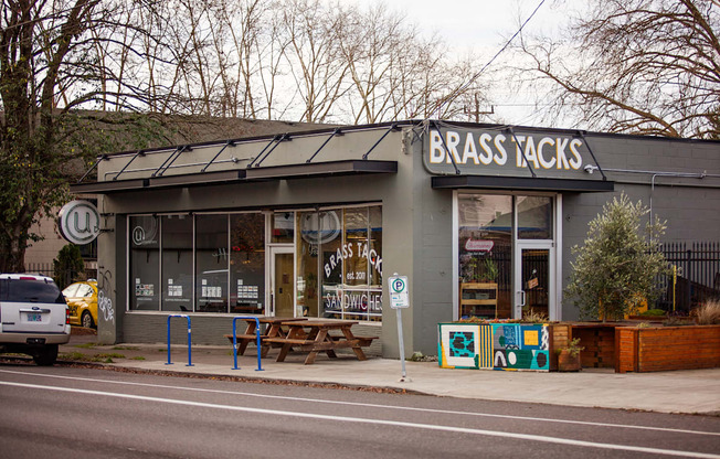 the exterior of a bass acids store on the side of a street