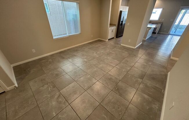 Gorgeous two-story home with 5 bedrooms and 3 bathrooms in a gated community