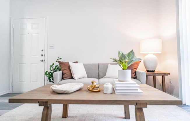 a living room with a couch and a coffee table