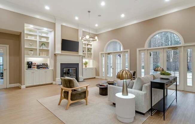 A modern living room with a fireplace and a television.