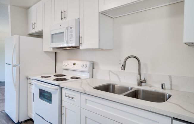 Winter Gardens | 1 & 2 Bedroom Apartments with Parking and Sparkling Pool!