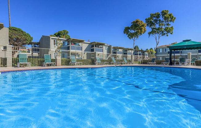 RELAX IN THE SHADED CABANA ALONGSIDE THE POOL