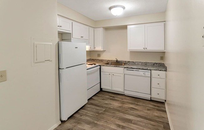 This is photo of the kitchen in the 565 square foot 1 bedroom apartment at Aspen Village Apartments in Cincinnati, OH.