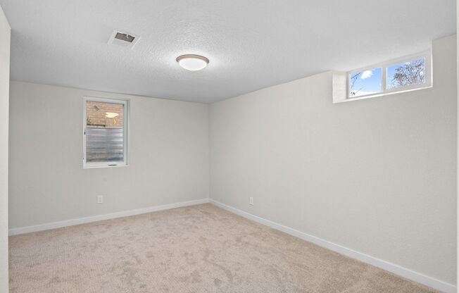 Newly Remodeled 2 Bed, 1 Bath Basement Unit Available in North Park Hill!