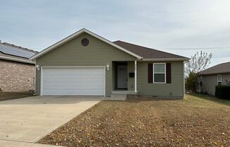 Adorable home with 3 bedrooms, 2 bathrooms located in Joplin! Attached two car garage and a must see!