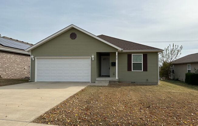 Adorable home with 3 bedrooms, 2 bathrooms located in Joplin! Attached two car garage and a must see!